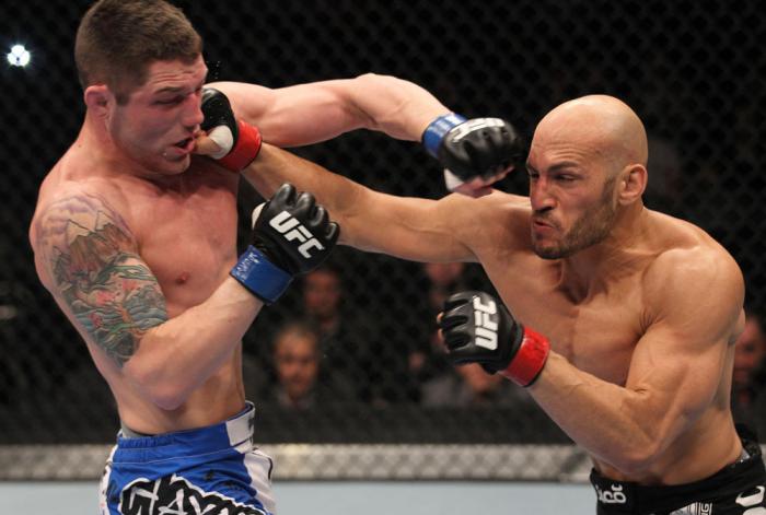 TORONTO, ON - DECEMBER 10: (R-L) Rich Attonito punches Jake Hecht during the UFC 140 event at Air Canada Centre on December 10, 2011 in Toronto, Ontario, Canada. (Photo by Nick Laham/Zuffa LLC/Zuffa LLC via Getty Images)