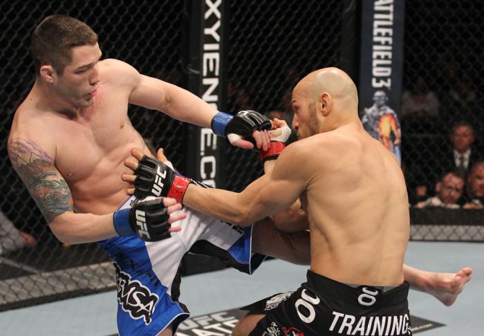 TORONTO, ON - DECEMBER 10: (L-R) Jake Hecht kicks Rich Attonito during the UFC 140 event at Air Canada Centre on December 10, 2011 in Toronto, Ontario, Canada. (Photo by Nick Laham/Zuffa LLC/Zuffa LLC via Getty Images)