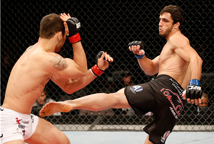 BELO HORIZONTE, BRAZIL - SEPTEMBER 04: (R-L) Elias Silverio kicks Joao Zeferino in their welterweight fight during the UFC on FOX Sports 1 event at Mineirinho Arena on September 4, 2013 in Belo Horizonte, Brazil. (Photo by Josh Hedges/Zuffa LLC/Zuffa LLC