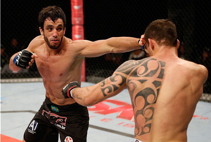 BELO HORIZONTE, BRAZIL - SEPTEMBER 04: (L-R) Elias Silverio punches Joao Zeferino in their welterweight fight during the UFC on FOX Sports 1 event at Mineirinho Arena on September 4, 2013 in Belo Horizonte, Brazil. (Photo by Josh Hedges/Zuffa LLC/Zuffa L