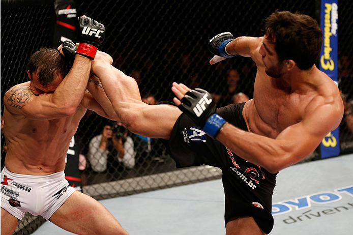 BELO HORIZONTE, BRAZIL - SEPTEMBER 04: (R-L) Elias Silverio kicks Joao Zeferino in their welterweight fight during the UFC on FOX Sports 1 event at Mineirinho Arena on September 4, 2013 in Belo Horizonte, Brazil. (Photo by Josh Hedges/Zuffa LLC/Zuffa LLC