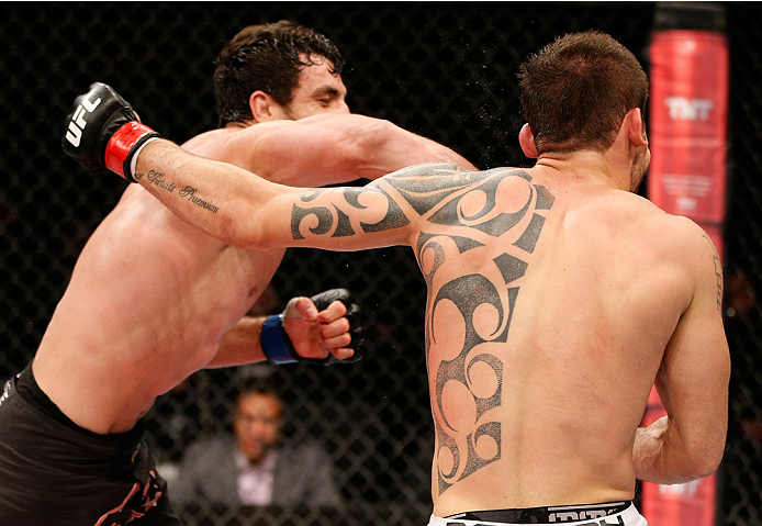 BELO HORIZONTE, BRAZIL - SEPTEMBER 04: (L-R) Elias Silverio punches Joao Zeferino in their welterweight fight during the UFC on FOX Sports 1 event at Mineirinho Arena on September 4, 2013 in Belo Horizonte, Brazil. (Photo by Josh Hedges/Zuffa LLC/Zuffa L