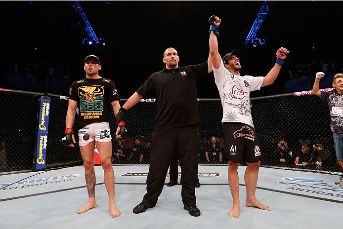 BELO HORIZONTE, BRAZIL - SEPTEMBER 04: Elias Silverio (R) reacts after his victory over Joao Zeferino in their welterweight fight during the UFC on FOX Sports 1 event at Mineirinho Arena on September 4, 2013 in Belo Horizonte, Brazil. (Photo by Josh Hedg