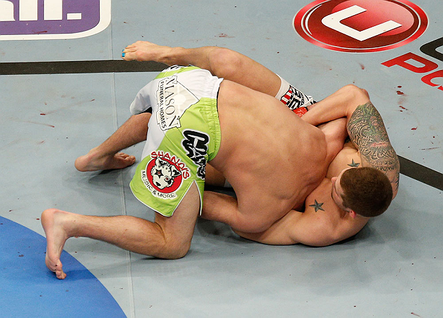 ANAHEIM, CA - FEBRUARY 23: Brock Jardine (right) attempts to submit Kenny Robertson in their welterweight bout during UFC 157 at Honda Center on February 23, 2013 in Anaheim, California. (Photo by Josh Hedges/Zuffa LLC/Zuffa LLC via Getty Images) *** Lo