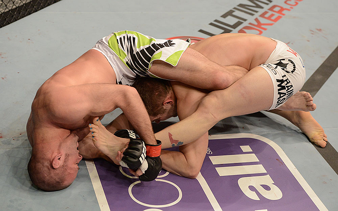 ANAHEIM, CA - FEBRUARY 23: Kenny Robertson (left) attempts to submit Brock Jardine in their welterweight bout during UFC 157 at Honda Center on February 23, 2013 in Anaheim, California. (Photo by Donald Miralle/Zuffa LLC/Zuffa LLC via Getty Images) ***