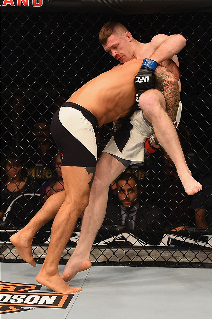 LAS VEGAS, NV - JANUARY 02: (L-R) Dustin Poirier attempts to take down Joe Duffy of Ireland in their lightweight bout during the UFC 195 event inside MGM Grand Garden Arena on January 2, 2016 in Las Vegas, Nevada. (Photo by Josh Hedges/Zuffa LLC/Zuffa LL