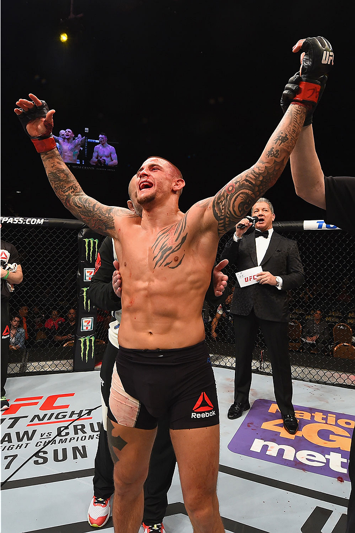 LAS VEGAS, NV - JANUARY 02: Dustin Poirier reacts to his victory over Joe Duffy of Ireland in their lightweight bout during the UFC 195 event inside MGM Grand Garden Arena on January 2, 2016 in Las Vegas, Nevada. (Photo by Josh Hedges/Zuffa LLC/Zuffa LLC