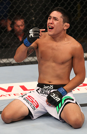 DENVER, CO - AUGUST 11: Erik Perez reacts after knocking out Ken Stone during their bantamweight bout at UFC 150 inside Pepsi Center on August 11, 2012 in Denver, Colorado. (Photo by Nick Laham/Zuffa LLC/Zuffa LLC via Getty Images)