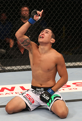 DENVER, CO - AUGUST 11: Erik Perez reacts after knocking out Ken Stone during their bantamweight bout at UFC 150 inside Pepsi Center on August 11, 2012 in Denver, Colorado. (Photo by Nick Laham/Zuffa LLC/Zuffa LLC via Getty Images)