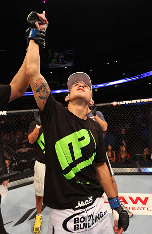 DENVER, CO - AUGUST 11: Erik Perez reacts after knocking out Ken Stone during their bantamweight bout at UFC 150 inside Pepsi Center on August 11, 2012 in Denver, Colorado. (Photo by Nick Laham/Zuffa LLC/Zuffa LLC via Getty Images)