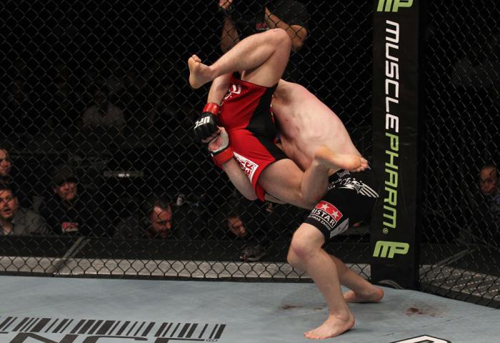 TORONTO, ON - DECEMBER 10: (R-L) Mark Bocek takes down Nik Lentz during the UFC 140 event at Air Canada Centre on December 10, 2011 in Toronto, Ontario, Canada. (Photo by Nick Laham/Zuffa LLC/Zuffa LLC via Getty Images)