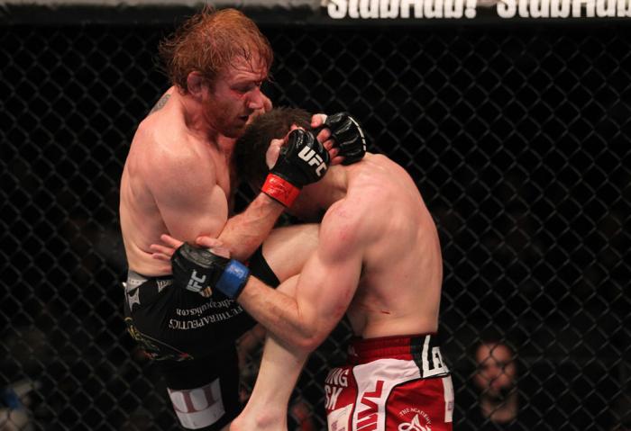 TORONTO, ON - DECEMBER 10: (L-R) Mark Bocek delivers a knee strike against Nik Lentz during the UFC 140 event at Air Canada Centre on December 10, 2011 in Toronto, Ontario, Canada. (Photo by Nick Laham/Zuffa LLC/Zuffa LLC via Getty Images)