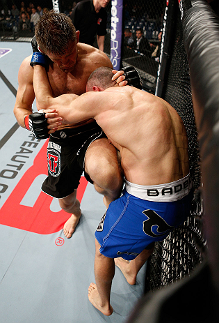 LONDON, ENGLAND - FEBRUARY 16: (L-R) Tom Watson knees Stanislav Nedkov in their middleweight fight during the UFC on Fuel TV event on February 16, 2013 at Wembley Arena in London, England. (Photo by Josh Hedges/Zuffa LLC/Zuffa LLC via Getty Images)