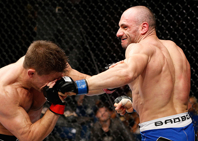 LONDON, ENGLAND - FEBRUARY 16: (R-L) Stanislav Nedkov punches Tom Watson in their middleweight fight during the UFC on Fuel TV event on February 16, 2013 at Wembley Arena in London, England. (Photo by Josh Hedges/Zuffa LLC/Zuffa LLC via Getty Images)