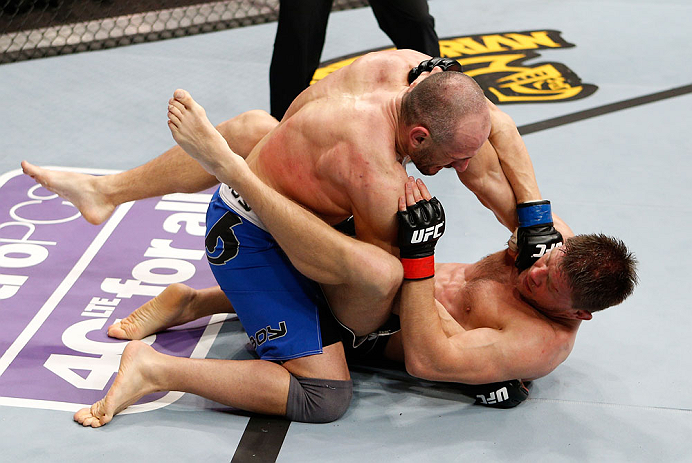 LONDON, ENGLAND - FEBRUARY 16: (L-R) Stanislav Nedkov punches Tom Watson in their middleweight fight during the UFC on Fuel TV event on February 16, 2013 at Wembley Arena in London, England. (Photo by Josh Hedges/Zuffa LLC/Zuffa LLC via Getty Images)