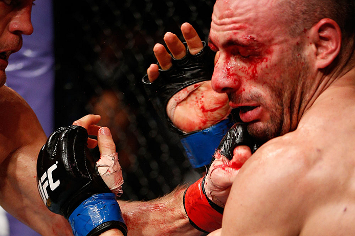 LONDON, ENGLAND - FEBRUARY 16: (L-R) Tom Watson punches Stanislav Nedkov in their middleweight fight during the UFC on Fuel TV event on February 16, 2013 at Wembley Arena in London, England. (Photo by Josh Hedges/Zuffa LLC/Zuffa LLC via Getty Images)