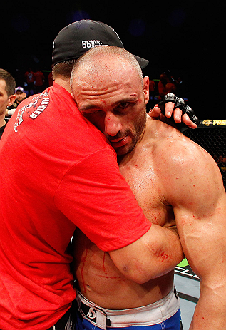 LONDON, ENGLAND - FEBRUARY 16: (L-R) Tom Watson and Stanislav Nedkov hug after their middleweight fight during the UFC on Fuel TV event on February 16, 2013 at Wembley Arena in London, England. (Photo by Josh Hedges/Zuffa LLC/Zuffa LLC via Getty Images)