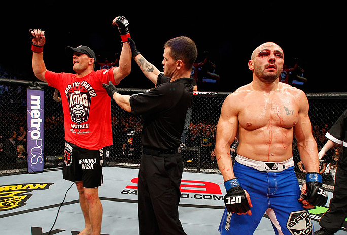 LONDON, ENGLAND - FEBRUARY 16: (L-R) Tom Watson reacts after defeating Stanislav Nedkov in their middleweight fight during the UFC on Fuel TV event on February 16, 2013 at Wembley Arena in London, England. (Photo by Josh Hedges/Zuffa LLC/Zuffa LLC via