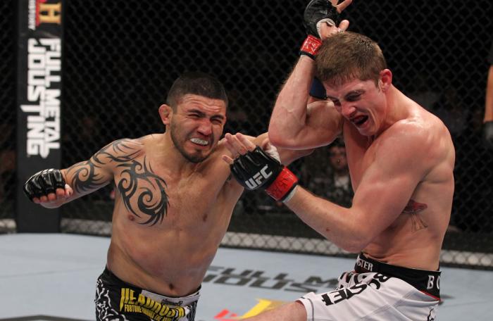 LAS VEGAS, NV - FEBRUARY 04: (R-L) Henry Martinez punches Matt Riddle during the UFC 143 event at Mandalay Bay Events Center on February 4, 2012 in Las Vegas, Nevada. (Photo by Nick Laham/Zuffa LLC/Zuffa LLC via Getty Images) *** Local Caption *** Henry