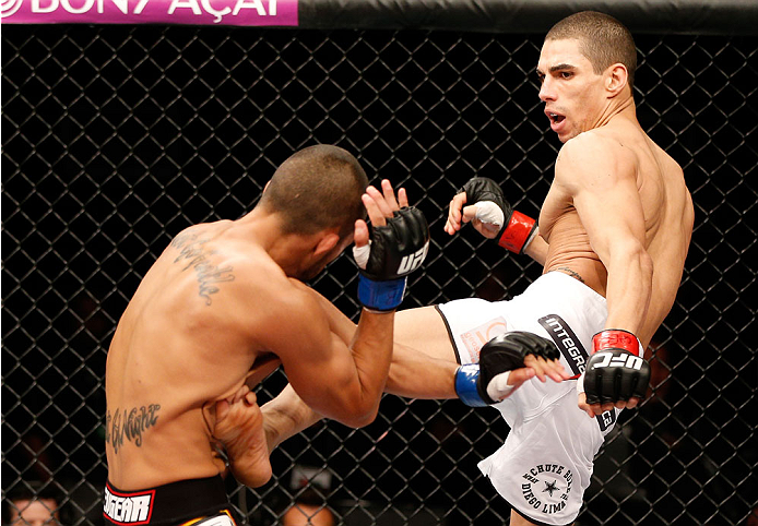 BELO HORIZONTE, BRAZIL - SEPTEMBER 04: (R-L) Lucas Martins kicks Junior Hernandez in their bantamweight fight during the UFC on FOX Sports 1 event at Mineirinho Arena on September 4, 2013 in Belo Horizonte, Brazil. (Photo by Josh Hedges/Zuffa LLC/Zuffa L