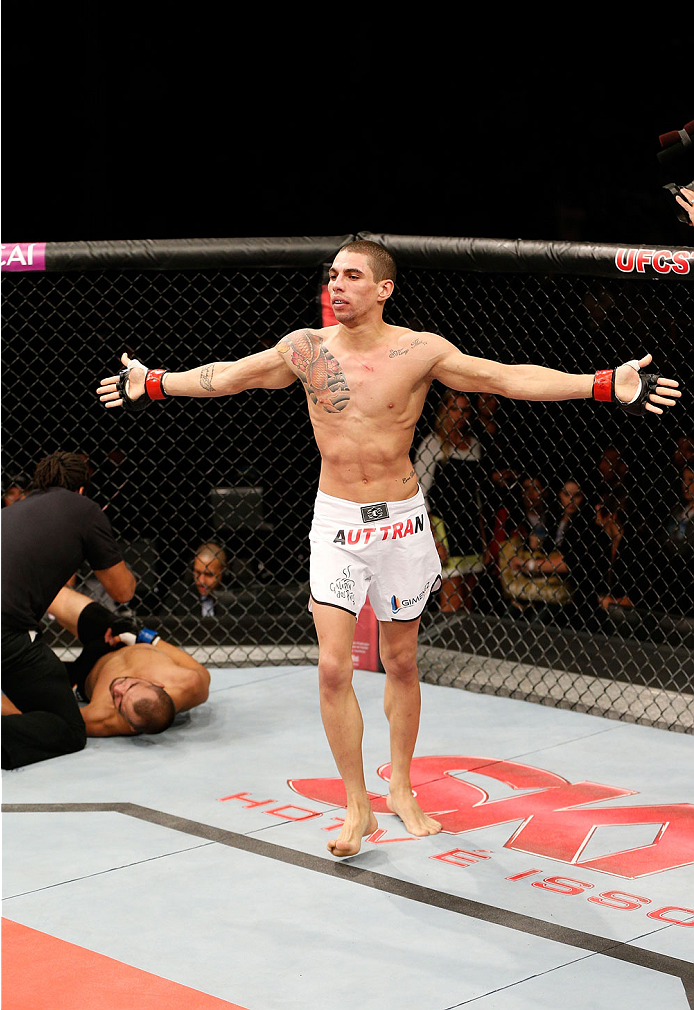 BELO HORIZONTE, BRAZIL - SEPTEMBER 04: Lucas Martins reacts after his submission victory over Junior Hernandez in their bantamweight fight during the UFC on FOX Sports 1 event at Mineirinho Arena on September 4, 2013 in Belo Horizonte, Brazil. (Photo by