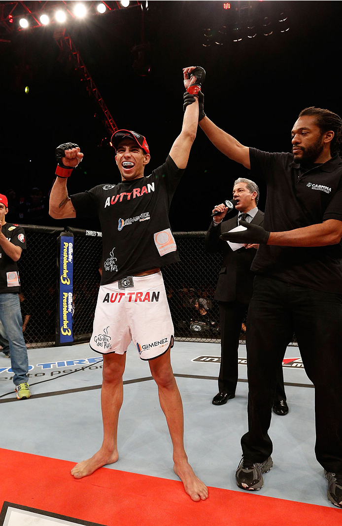 BELO HORIZONTE, BRAZIL - SEPTEMBER 04: Lucas Martins reacts after his submission victory over Junior Hernandez in their bantamweight fight during the UFC on FOX Sports 1 event at Mineirinho Arena on September 4, 2013 in Belo Horizonte, Brazil. (Photo by