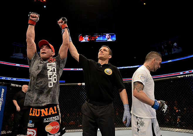 ANAHEIM, CA - FEBRUARY 23: Sam Stout reacts to his victoy over Caros Fodor (right) in their lightweight bout during UFC 157 at Honda Center on February 23, 2013 in Anaheim, California. (Photo by Donald Miralle/Zuffa LLC/Zuffa LLC via Getty Images) *** L