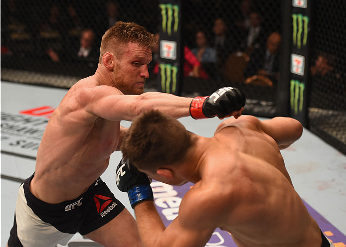 LAS VEGAS, NV - JANUARY 02: (L-R) Scott Holtzman punches Drew Dober in their lightweight bout during the UFC 195 event inside MGM Grand Garden Arena on January 2, 2016 in Las Vegas, Nevada. (Photo by Josh Hedges/Zuffa LLC/Zuffa LLC via Getty Images)