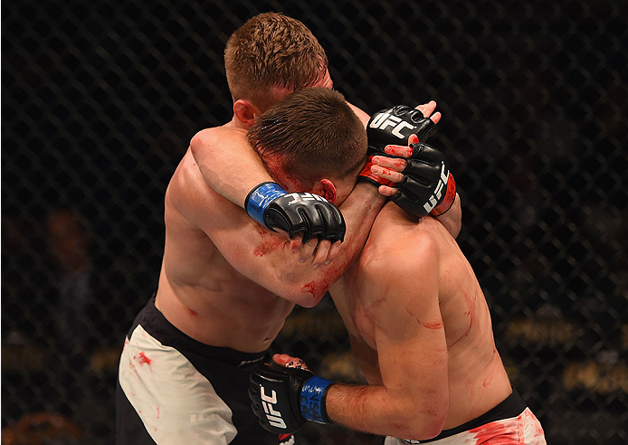 LAS VEGAS, NV - JANUARY 02: (L-R) Scott Holtzman attempts to submit Drew Dober in their lightweight bout during the UFC 195 event inside MGM Grand Garden Arena on January 2, 2016 in Las Vegas, Nevada. (Photo by Josh Hedges/Zuffa LLC/Zuffa LLC via Getty I