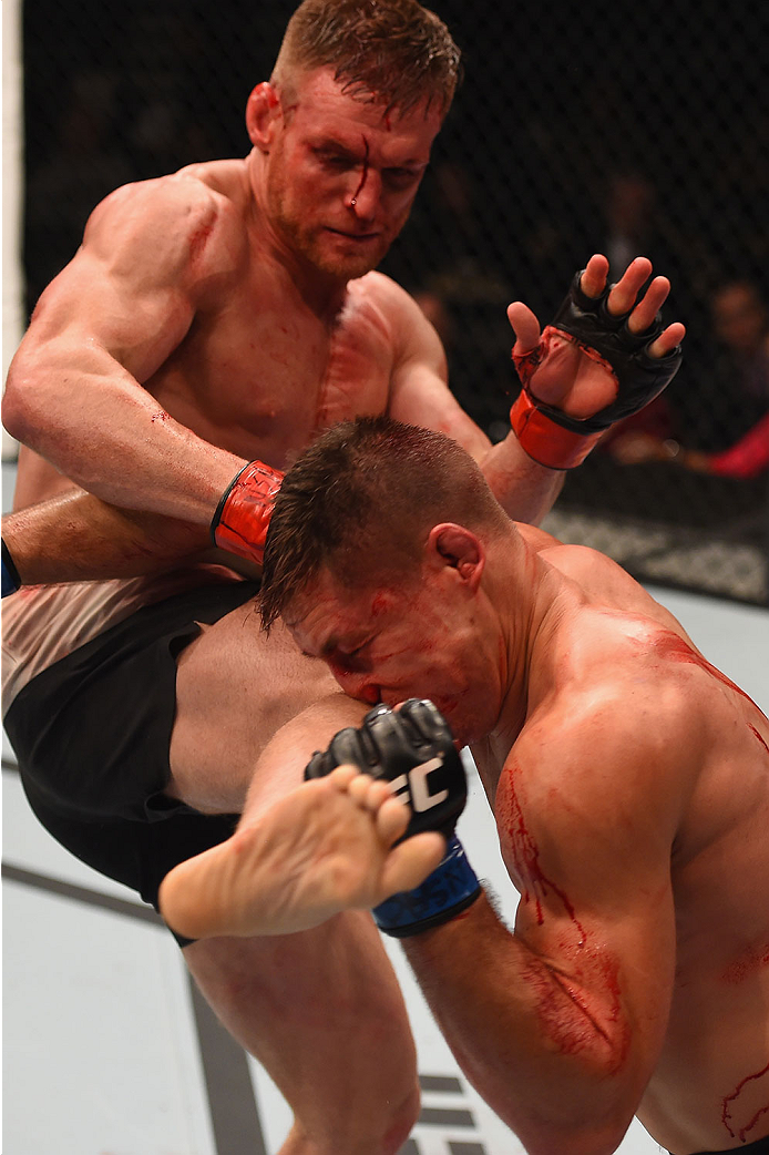 LAS VEGAS, NV - JANUARY 02: (L-R) Scott Holtzman kicks Drew Dober in their lightweight bout during the UFC 195 event inside MGM Grand Garden Arena on January 2, 2016 in Las Vegas, Nevada. (Photo by Josh Hedges/Zuffa LLC/Zuffa LLC via Getty Images)