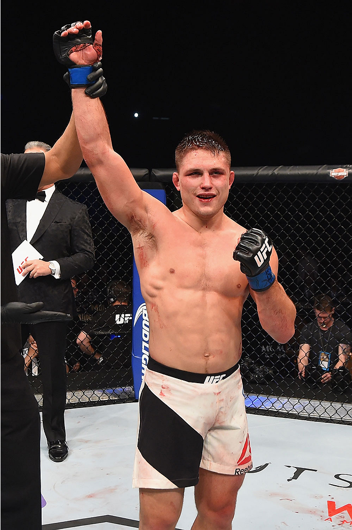 LAS VEGAS, NV - JANUARY 02: Drew Dober reacts to his victory over Scott Holtzman in their lightweight bout during the UFC 195 event inside MGM Grand Garden Arena on January 2, 2016 in Las Vegas, Nevada. (Photo by Josh Hedges/Zuffa LLC/Zuffa LLC via Getty