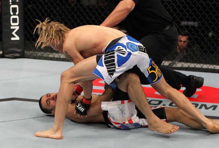 OMAHA, NE - FEBRUARY 15: (R-L) Jonathan Brookins knocks out Vagner Rocha with a punch on the ground during the UFC on FUEL TV event at Omaha Civic Auditorium on February 15, 2012 in Omaha, Nebraska. (Photo by Josh Hedges/Zuffa LLC/Zuffa LLC via Getty Im