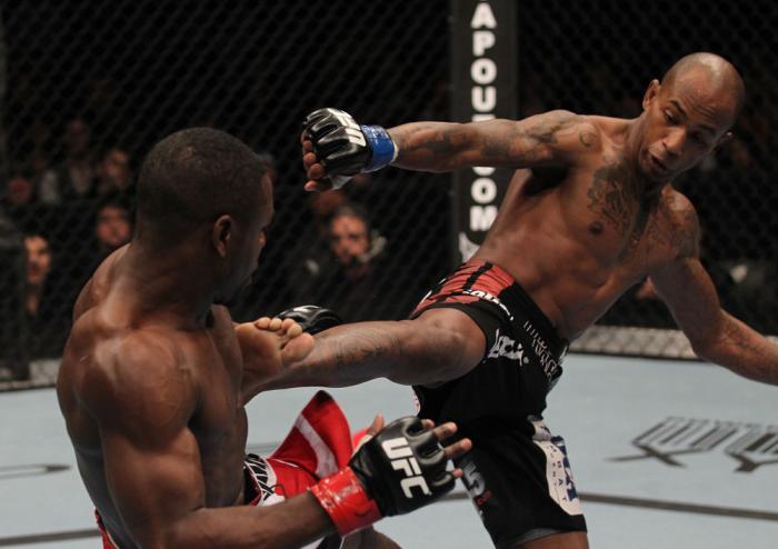 TORONTO, ON - DECEMBER 10: (R-L) Walel Watson kicks Yves Jabouin during the UFC 140 event at Air Canada Centre on December 10, 2011 in Toronto, Ontario, Canada. (Photo by Nick Laham/Zuffa LLC/Zuffa LLC via Getty Images)