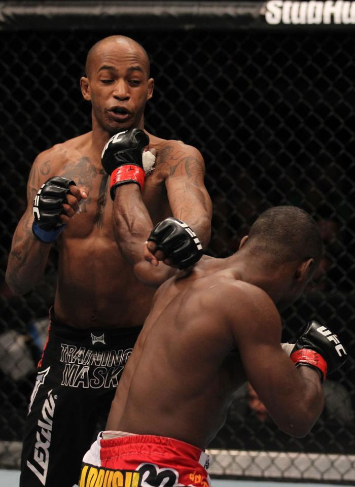 TORONTO, ON - DECEMBER 10: (R-L) Yves Jabouin punches Walel Watson during the UFC 140 event at Air Canada Centre on December 10, 2011 in Toronto, Ontario, Canada. (Photo by Nick Laham/Zuffa LLC/Zuffa LLC via Getty Images)