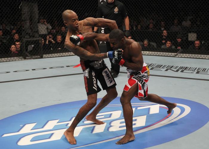 TORONTO, ON - DECEMBER 10: (R-L) Yves Jabouin punches Walel Watson during the UFC 140 event at Air Canada Centre on December 10, 2011 in Toronto, Ontario, Canada. (Photo by Nick Laham/Zuffa LLC/Zuffa LLC via Getty Images)