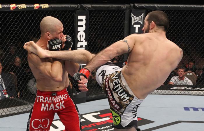 LAS VEGAS, NV - FEBRUARY 04: Matt Brown (right) kicks Chris Cope during the UFC 143 event at Mandalay Bay Events Center on February 4, 2012 in Las Vegas, Nevada. (Photo by Nick Laham/Zuffa LLC/Zuffa LLC via Getty Images) *** Local Caption *** Matt Brown