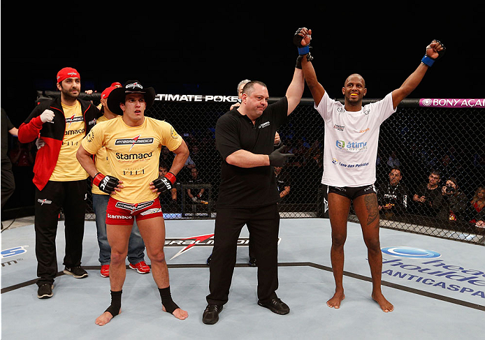 BELO HORIZONTE, BRAZIL - SEPTEMBER 04: Kevin Souza (R) reacts after defeating Felipe Arantes by split decision in their featherweight fight during the UFC on FOX Sports 1 event at Mineirinho Arena on September 4, 2013 in Belo Horizonte, Brazil. (Photo by