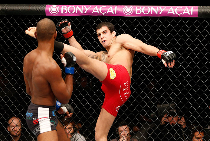 BELO HORIZONTE, BRAZIL - SEPTEMBER 04: (R-L) Felipe Arantes kicks Kevin Souza in their featherweight fight during the UFC on FOX Sports 1 event at Mineirinho Arena on September 4, 2013 in Belo Horizonte, Brazil. (Photo by Josh Hedges/Zuffa LLC/Zuffa LLC