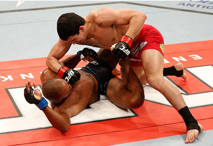 BELO HORIZONTE, BRAZIL - SEPTEMBER 04: (R-L) Felipe Arantes punches Kevin Souza in their featherweight fight during the UFC on FOX Sports 1 event at Mineirinho Arena on September 4, 2013 in Belo Horizonte, Brazil. (Photo by Josh Hedges/Zuffa LLC/Zuffa LL