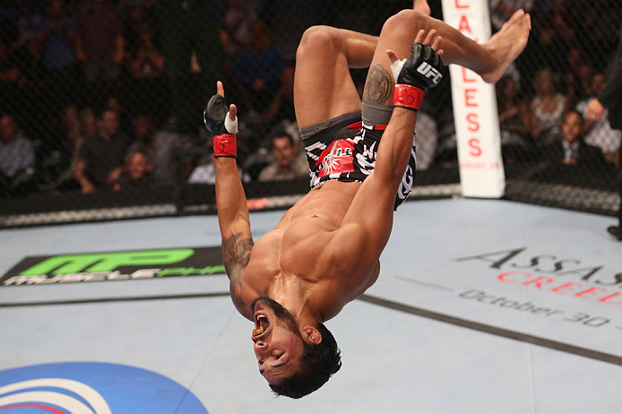 DENVER, CO - AUGUST 11: Dennis Bermudez reacts after submitting Tom Hayden during their featherweight bout at UFC 150 inside Pepsi Center on August 11, 2012 in Denver, Colorado. (Photo by Nick Laham/Zuffa LLC/Zuffa LLC via Getty Images)