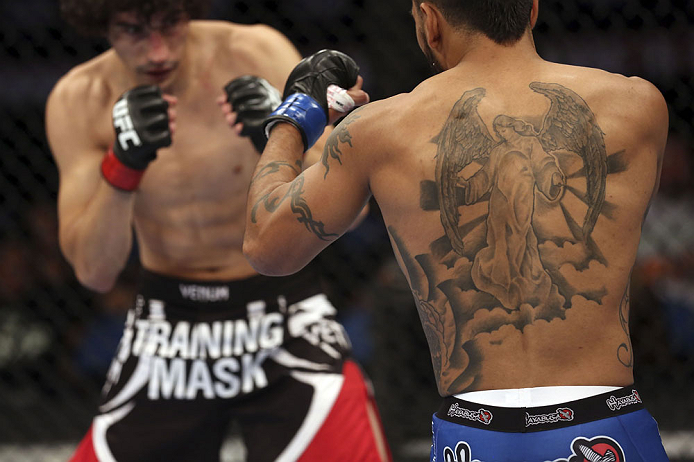 CALGARY, CANADA - JULY 21: (L-R) Roland Delorme looks to attack Francisco Rivera during their bantamweight bout at UFC 149 inside the Scotiabank Saddledome on July 21, 2012 in Calgary, Alberta, Canada. (Photo by Nick Laham/Zuffa LLC/Zuffa LLC via Getty I