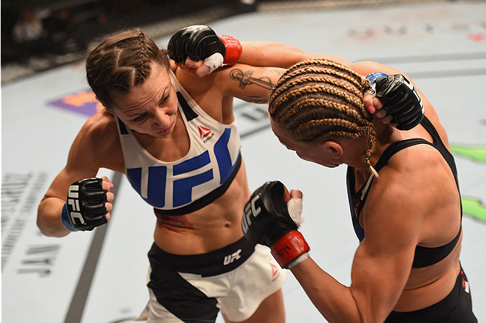 LAS VEGAS, NV - JANUARY 02: (R-L) Justine Kish punches Nina Ansaroff in their women's strawweight bout during the UFC 195 event inside MGM Grand Garden Arena on January 2, 2016 in Las Vegas, Nevada. (Photo by Josh Hedges/Zuffa LLC/Zuffa LLC via Getty Ima