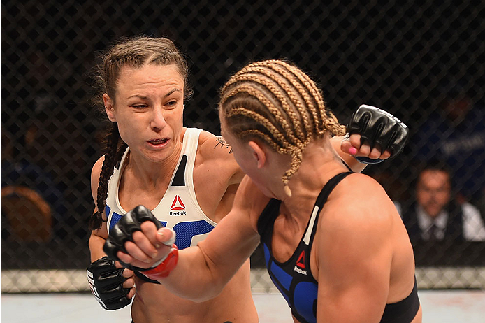 LAS VEGAS, NV - JANUARY 02: (L-R) Nina Ansaroff punches Justine Kish in their women's strawweight bout during the UFC 195 event inside MGM Grand Garden Arena on January 2, 2016 in Las Vegas, Nevada. (Photo by Josh Hedges/Zuffa LLC/Zuffa LLC via Getty Ima