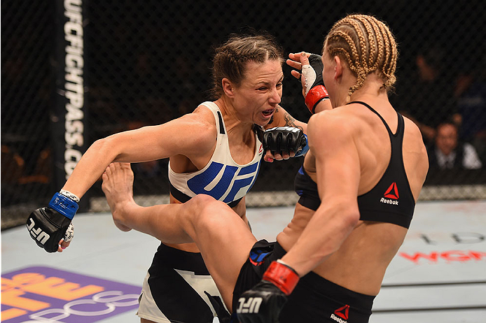 LAS VEGAS, NV - JANUARY 02: (R-L) Justine Kish kicks Nina Ansaroff in their women's strawweight bout during the UFC 195 event inside MGM Grand Garden Arena on January 2, 2016 in Las Vegas, Nevada. (Photo by Josh Hedges/Zuffa LLC/Zuffa LLC via Getty Image