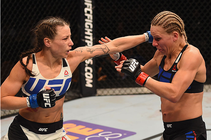 LAS VEGAS, NV - JANUARY 02: (L-R) Nina Ansaroff punches Justine Kish in their women's strawweight bout during the UFC 195 event inside MGM Grand Garden Arena on January 2, 2016 in Las Vegas, Nevada. (Photo by Josh Hedges/Zuffa LLC/Zuffa LLC via Getty Ima