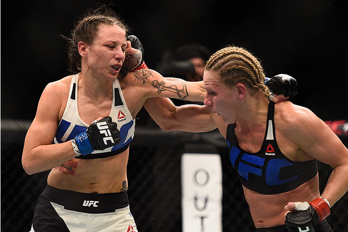LAS VEGAS, NV - JANUARY 02: (R-L) Justine Kish punches Nina Ansaroff in their women's strawweight bout during the UFC 195 event inside MGM Grand Garden Arena on January 2, 2016 in Las Vegas, Nevada. (Photo by Jeff Bottari/Zuffa LLC/Zuffa LLC via Getty Im