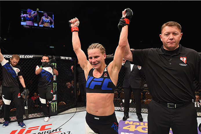 LAS VEGAS, NV - JANUARY 02: Justine Kish reacts to her victory over Nina Ansaroff in their women's strawweight bout during the UFC 195 event inside MGM Grand Garden Arena on January 2, 2016 in Las Vegas, Nevada. (Photo by Josh Hedges/Zuffa LLC/Zuffa LLC