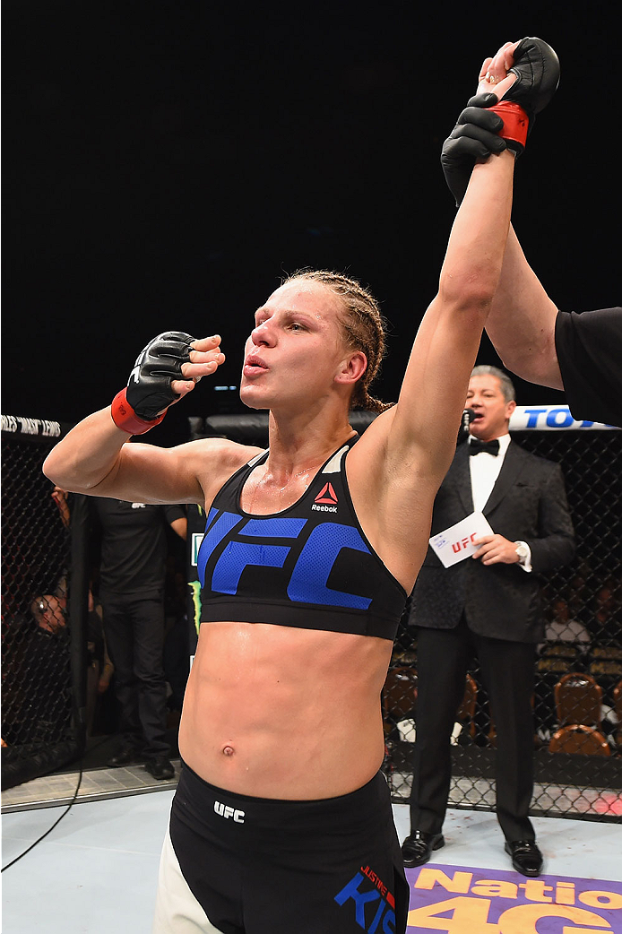 LAS VEGAS, NV - JANUARY 02: Justine Kish reacts to her victory over Nina Ansaroff in their women's strawweight bout during the UFC 195 event inside MGM Grand Garden Arena on January 2, 2016 in Las Vegas, Nevada. (Photo by Josh Hedges/Zuffa LLC/Zuffa LLC