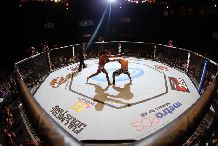 LAS VEGAS, NV - FEBRUARY 04: (L-R) Alex Caceres and Edwin Figueroa exchange blows during the UFC 143 event at Mandalay Bay Events Center on February 4, 2012 in Las Vegas, Nevada. (Photo by Nick Laham/Zuffa LLC/Zuffa LLC via Getty Images) *** Local Capti