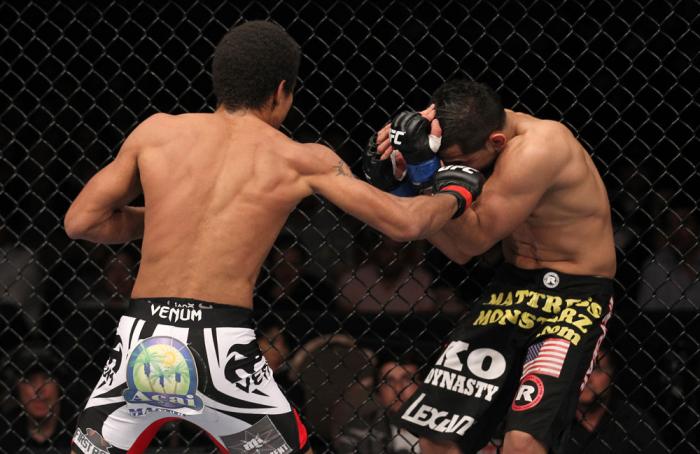 LAS VEGAS, NV - FEBRUARY 04: Alex Caceres (left) punches Edwin Figueroa during the UFC 143 event at Mandalay Bay Events Center on February 4, 2012 in Las Vegas, Nevada. (Photo by Nick Laham/Zuffa LLC/Zuffa LLC via Getty Images) *** Local Caption *** Ale